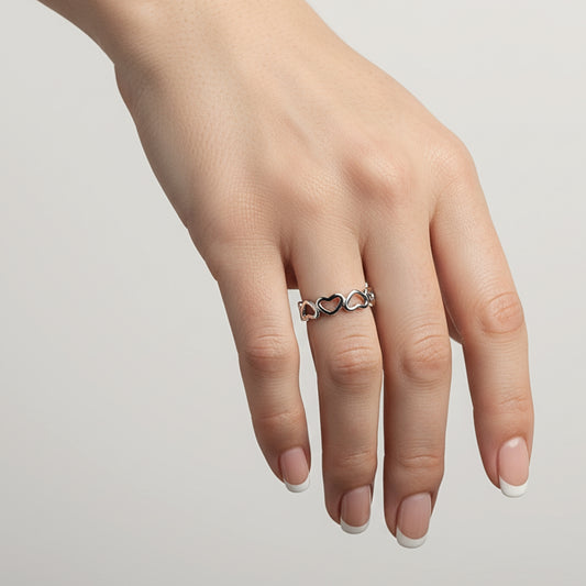 Anello Sincera | Sequenza di cuori intrecciati in Acciaio Inox