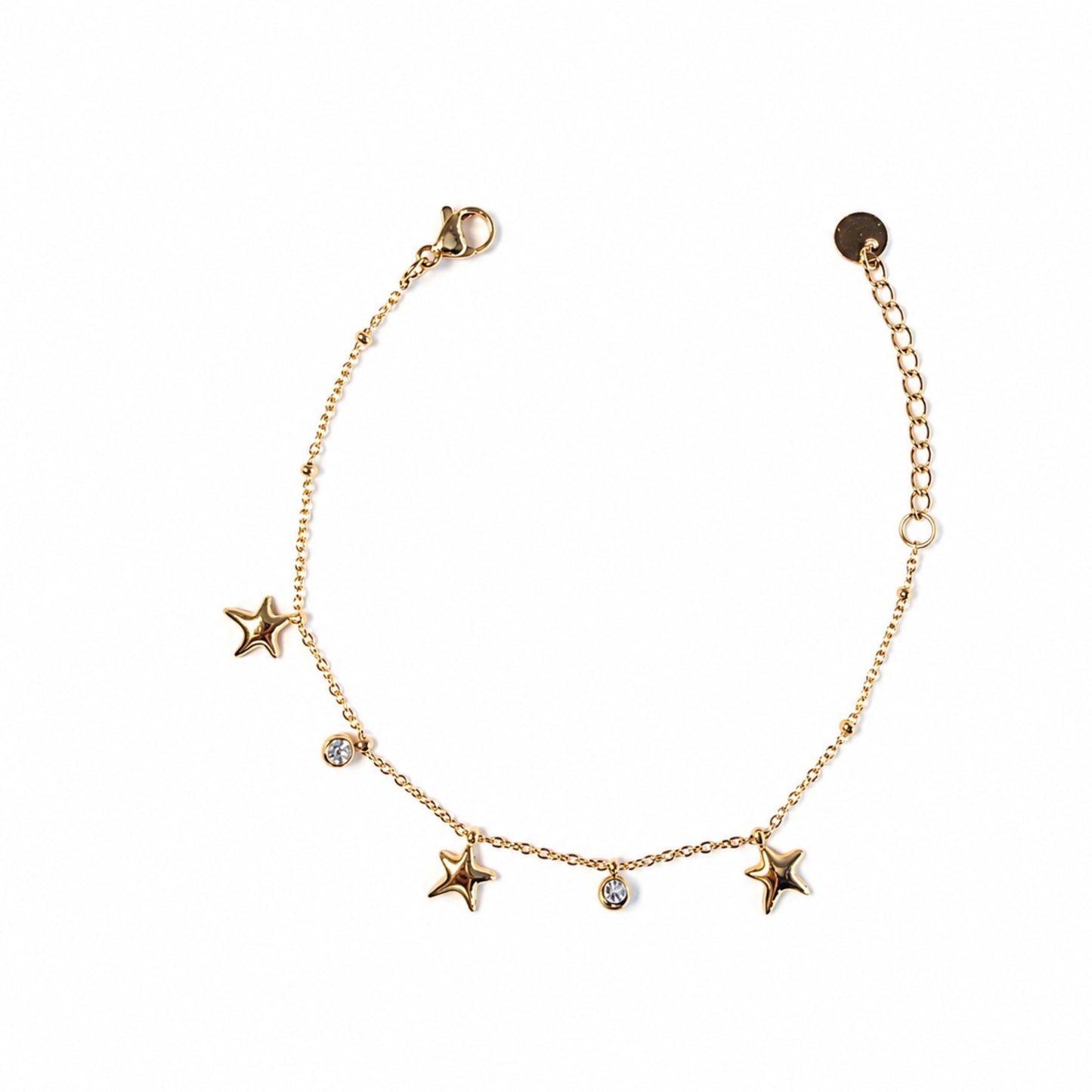 Dettaglio del bracciale Marea color argento con stelle marine pendenti e cristalli luminosi