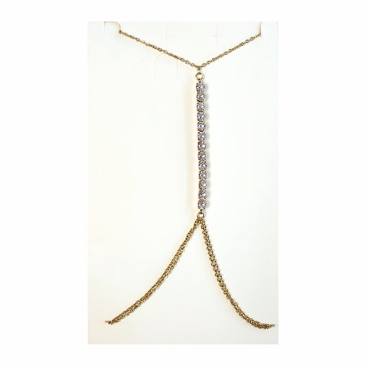 Body chain Scia di Luce in acciaio inox indossata su pelle abbronzata