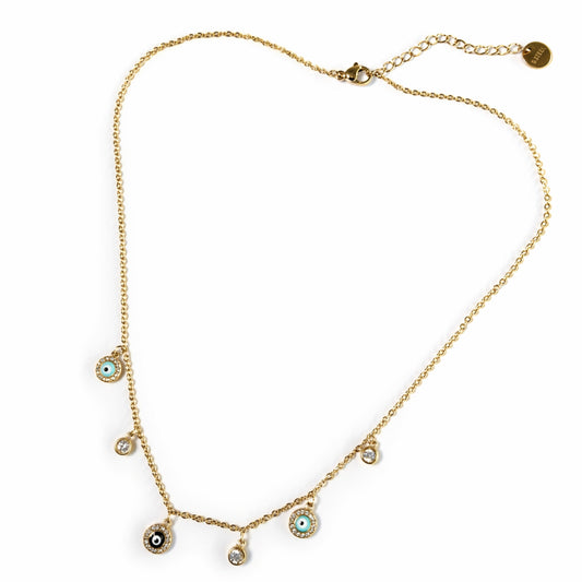 Collana Aegis in acciaio inox con charms occhio portafortuna e cristalli su sfondo chiaro