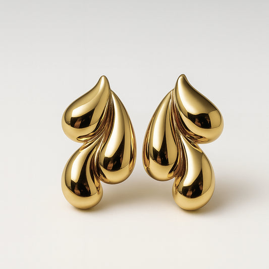 Orecchini Liquidi in Acciaio Inox – Design Moderno e Chic