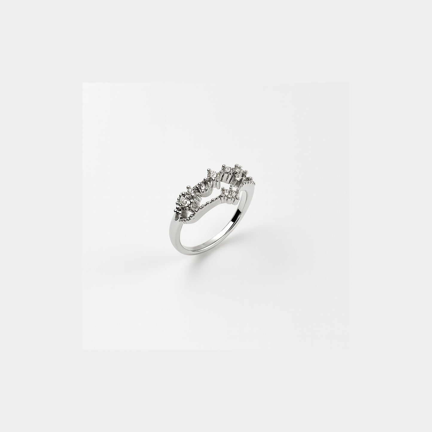 Tiara — anello regolabile in acciaio inox con zirconi effetto corona