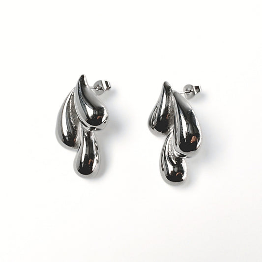 Orecchini Liquidi in Acciaio Inox – Design Moderno e Chic