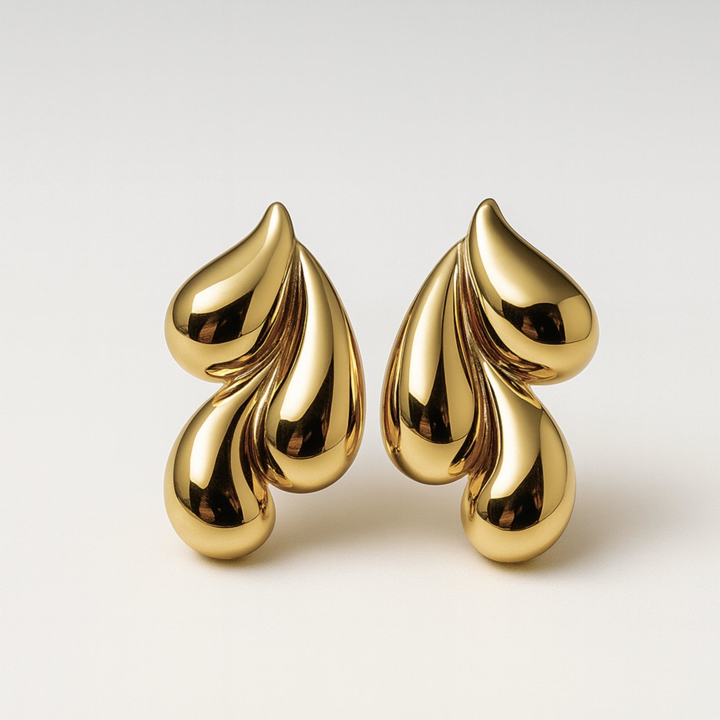 Orecchini Liquidi in Acciaio Inox – Design Moderno e Chic