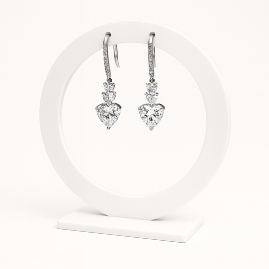 Amour Drop · Orecchini pendenti con pietre a cuore e strass in acciaio inox