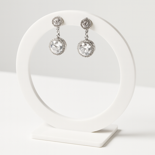 Celeste Shine · Orecchini pendenti con doppio cerchio di brillanti in acciaio inox