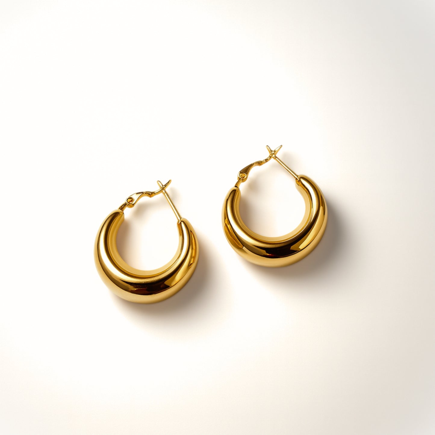 Orecchini Mezzaluna in Acciaio Inox – Cerchi Bold Eleganti