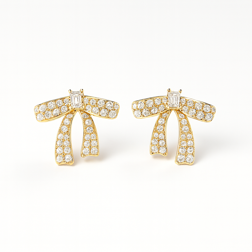 Knot · Orecchini a fiocco in acciaio inox con strass