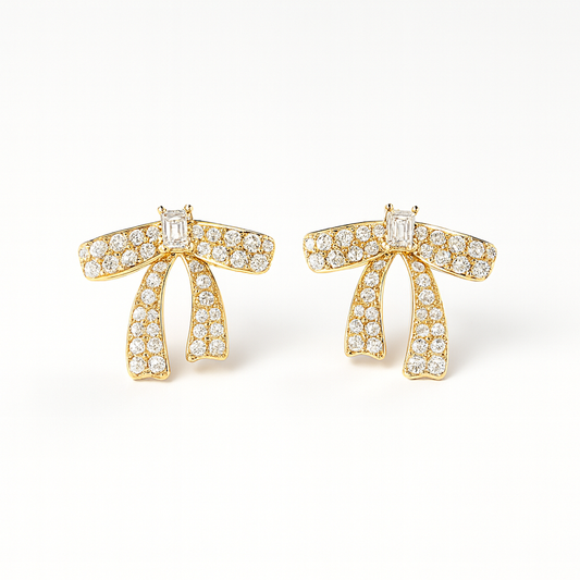 Knot · Orecchini a fiocco in acciaio inox con strass