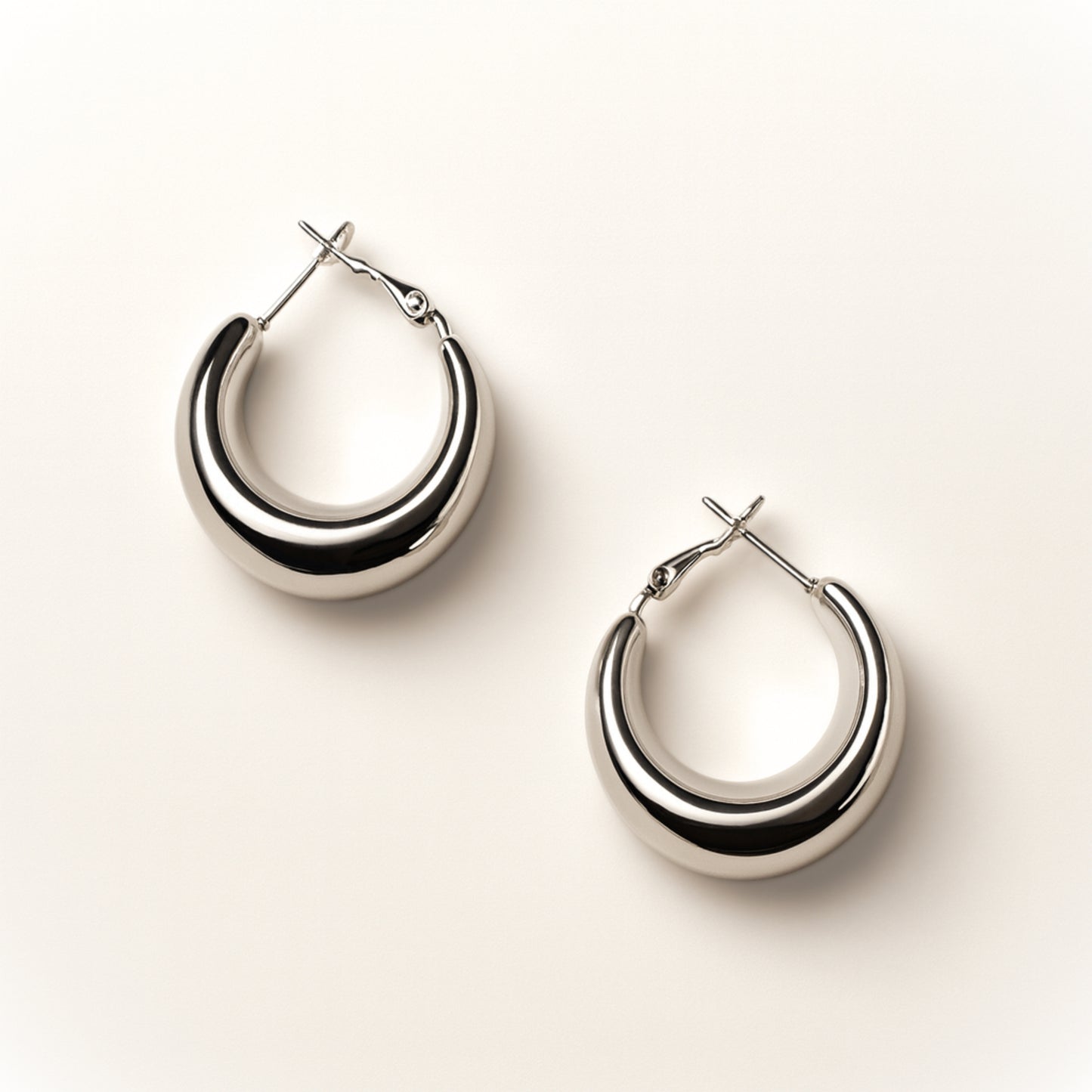 Orecchini Mezzaluna in Acciaio Inox – Cerchi Bold Eleganti