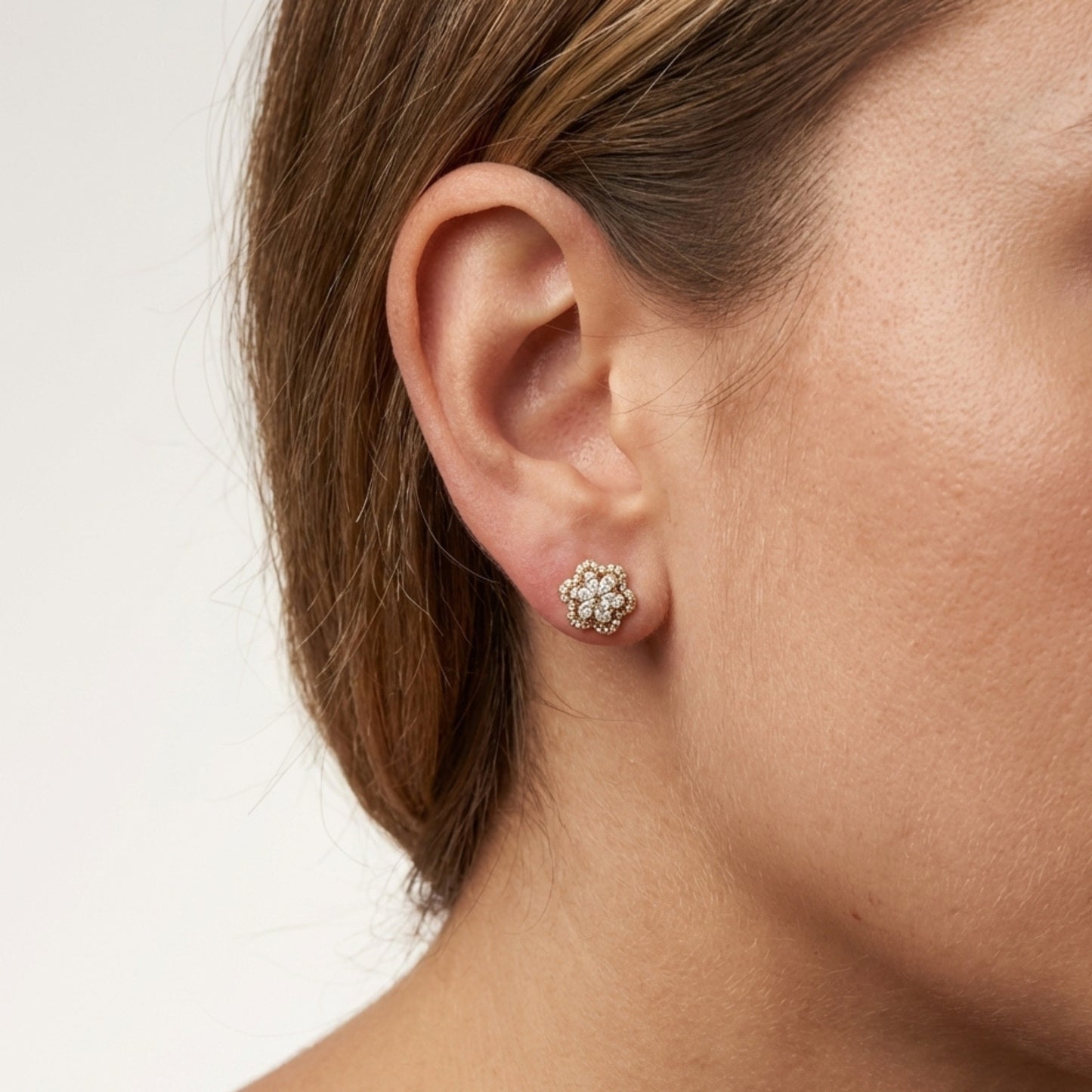 Fiorenì · Orecchini fiore in pavé di acciaio inossidabile