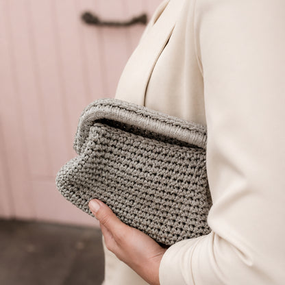 Vespro Clutch pochette intrecciata metallizzata color argento
