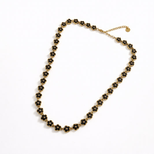 Fiorella Bloom – Collana Floreale Nera in Acciaio Inox Dorato